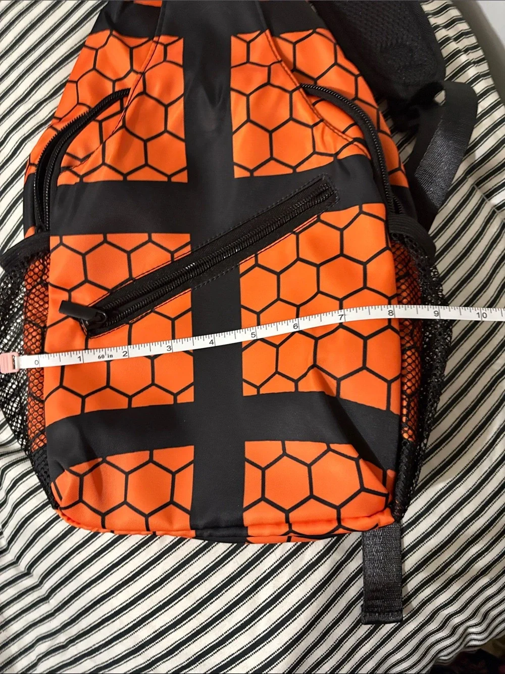 Orange and Black Hex-Pattern Sling Bag